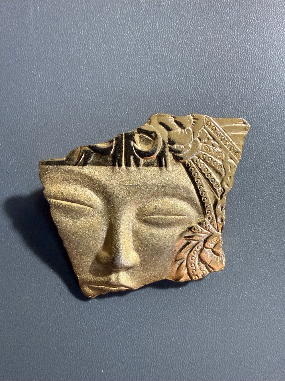 Vintage gold-tone goddess fragment brooch